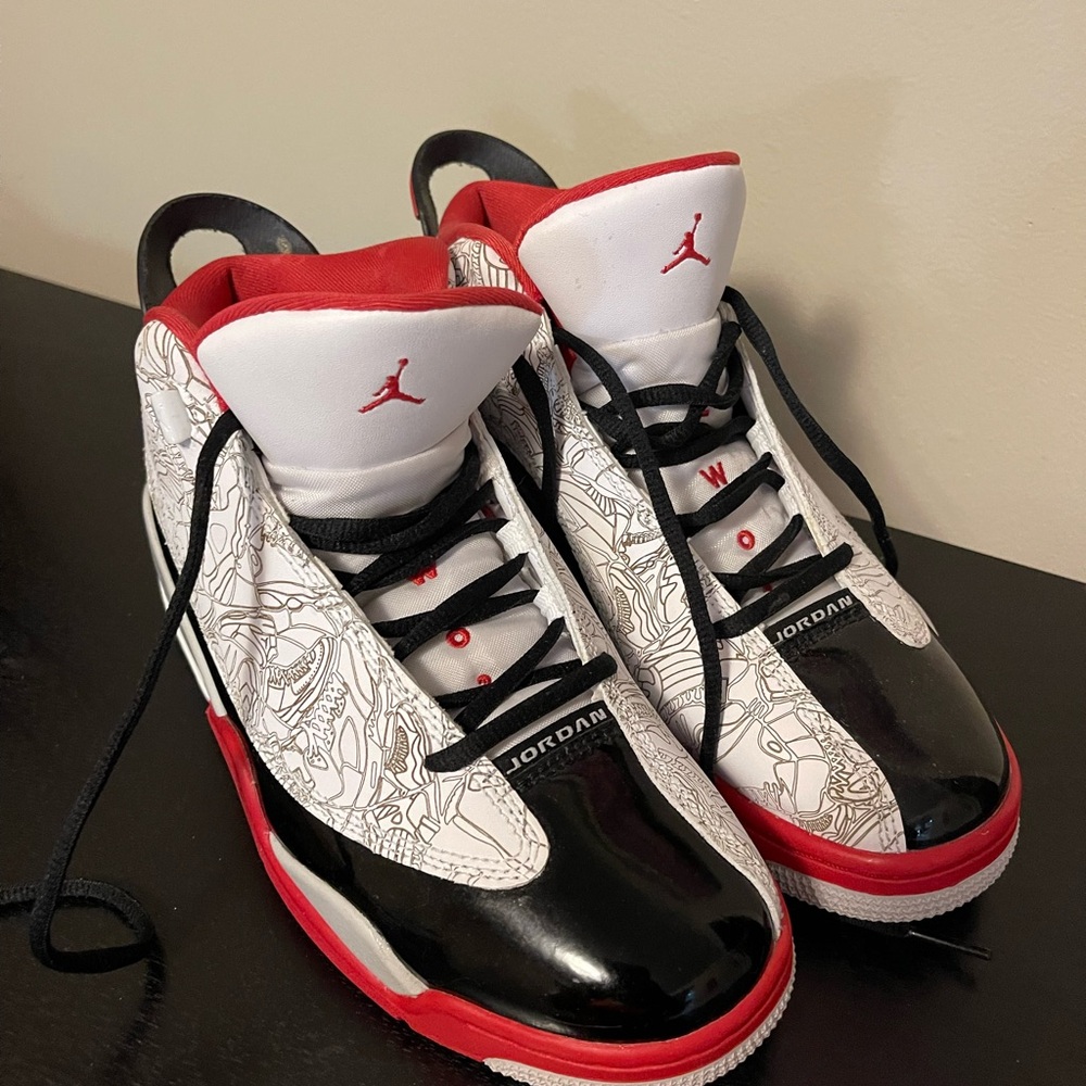 6.5 youth red and black Jordan’s